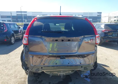 2016 Honda Cr-V Touring z USA, uszkodzony, nr VIN 5J6RM3H92GL031415